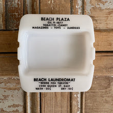 Load image into Gallery viewer, Vintage Beach Plaza & Beach Laundromat Advertising Milk Glass Ashtray c1950s