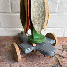 Load image into Gallery viewer, Rare 1940s Wooden Clown Whirligig Pull Toy - Hand Painted Folk Art Spinner with Felt Petals
