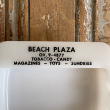 Load image into Gallery viewer, Vintage Beach Plaza &amp; Beach Laundromat Advertising Milk Glass Ashtray c1950s
